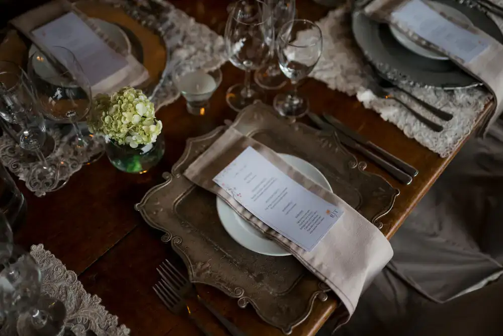 An intimate private tasting setup with elegant tableware and chocolate boards